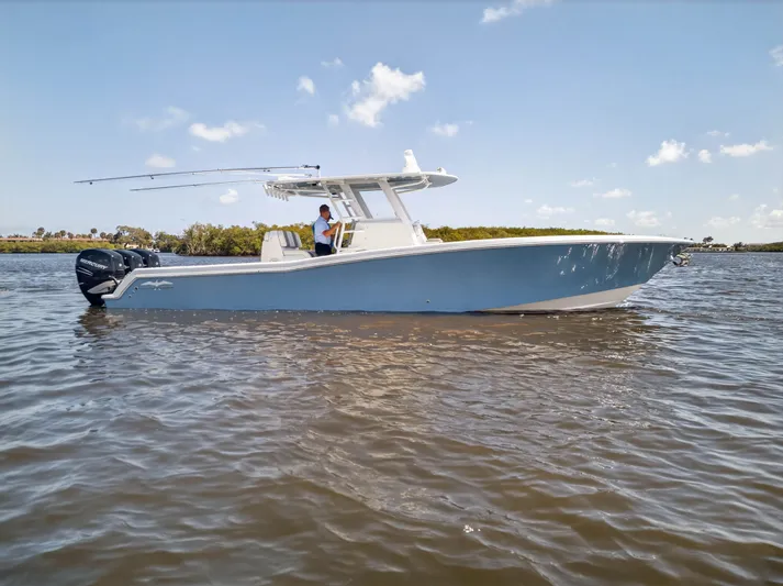  Yacht Photos Pics 2023 Invincible 36 Open Fisherman on calm waters.
