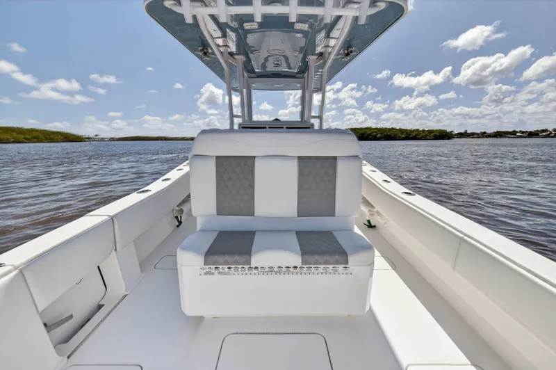  Yacht Photos Pics Invincible 36 Open Fisherman 2023 on calm waters.