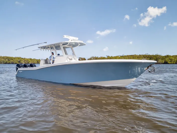  Yacht Photos Pics 2023 Invincible 36 Open Fisherman on calm waters.