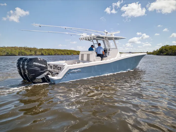  Yacht Photos Pics 2023 Invincible 36 Open Fisherman on water with triple Mercury engines.