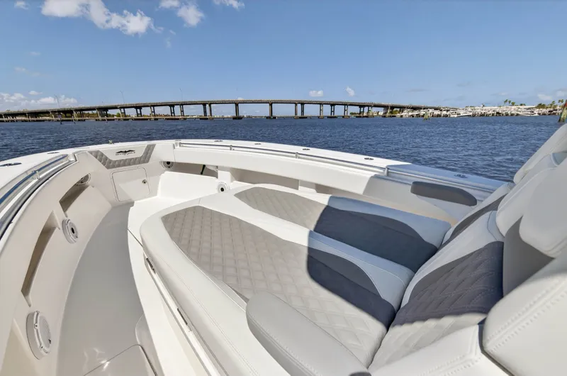  Yacht Photos Pics Invincible 36 Open Fisherman 2023 with luxurious seating on the water.