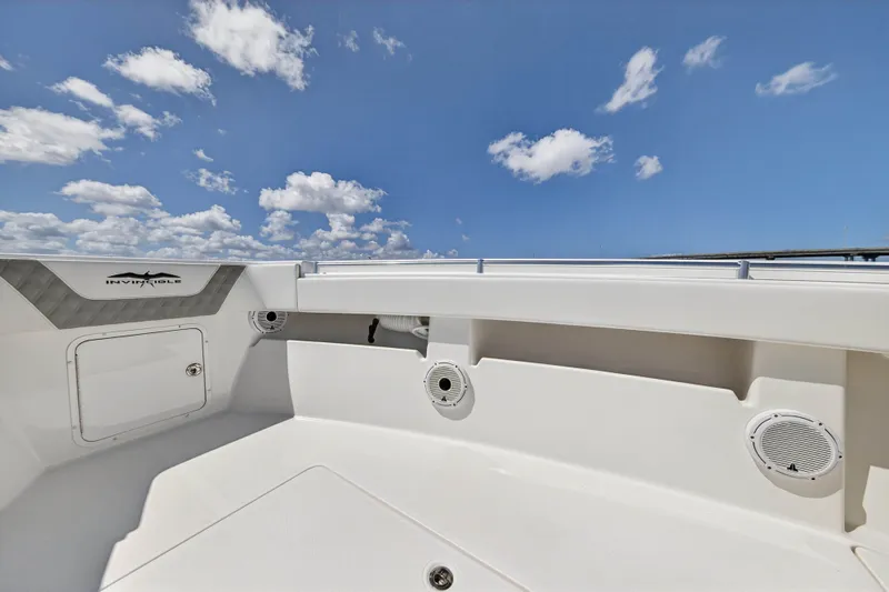  Yacht Photos Pics Invincible 36 Open Fisherman 2023, boat deck with speakers under blue sky.
