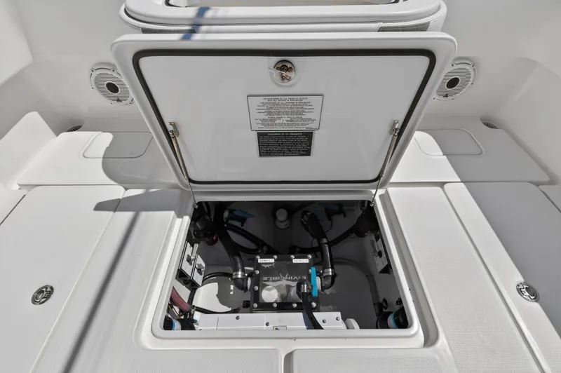  Yacht Photos Pics Open storage compartment in Invincible 36 Open Fisherman 2023 boat.