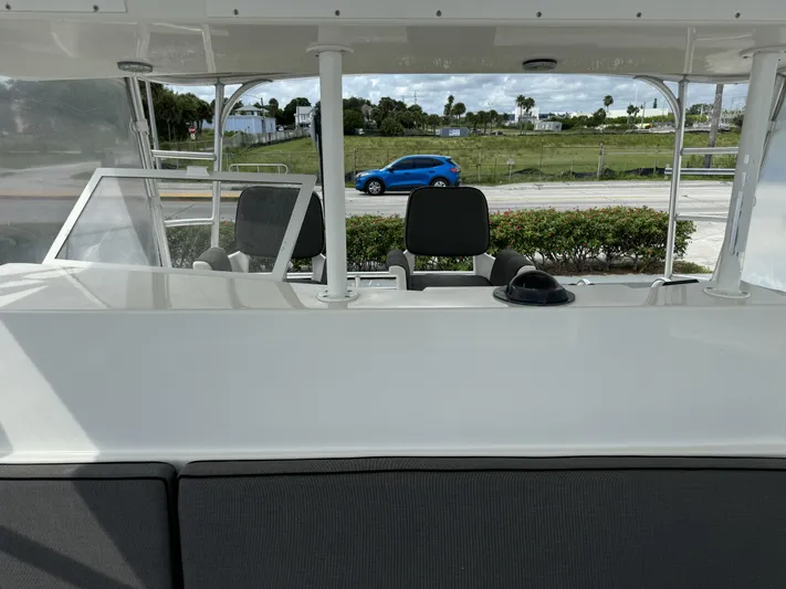  Yacht Photos Pics 1996 Viking 50 Convertible boat interior with seating and dashboard view.