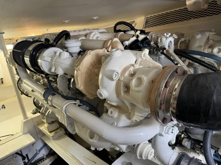  Yacht Photos Pics Engine room of 1996 Viking 50 Convertible yacht, showcasing detailed machinery.