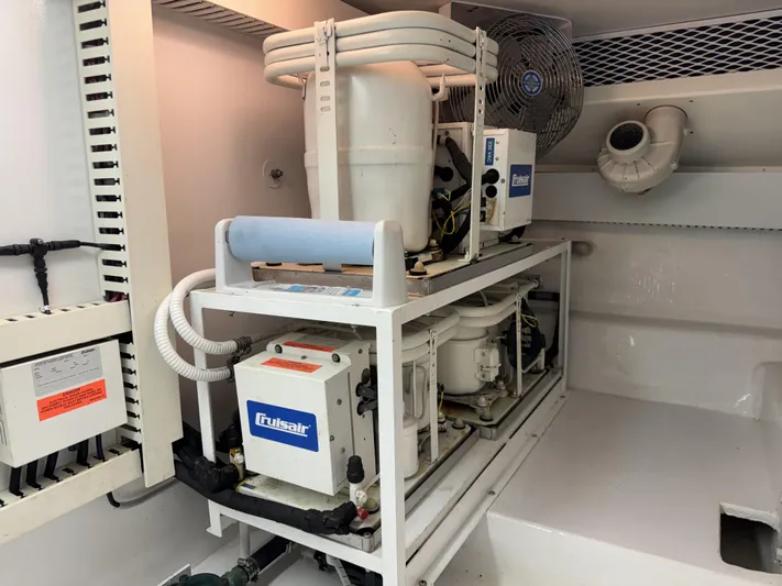  Yacht Photos Pics Engine room of 1996 Viking 50 Convertible with Cruisair system.