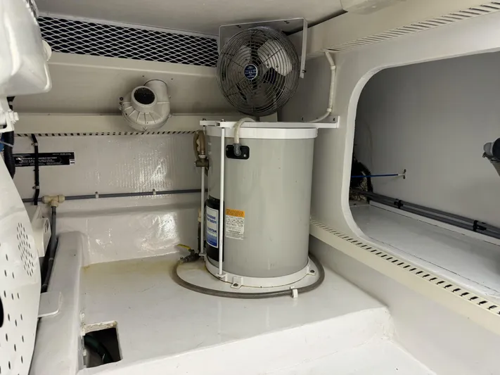  Yacht Photos Pics Engine room of 1996 Viking 50 Convertible yacht with ventilation fan and equipment.