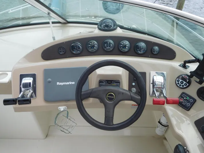  Yacht Photos Pics 2006 Carver 36 Mariner helm with Raymarine navigation and control panel.