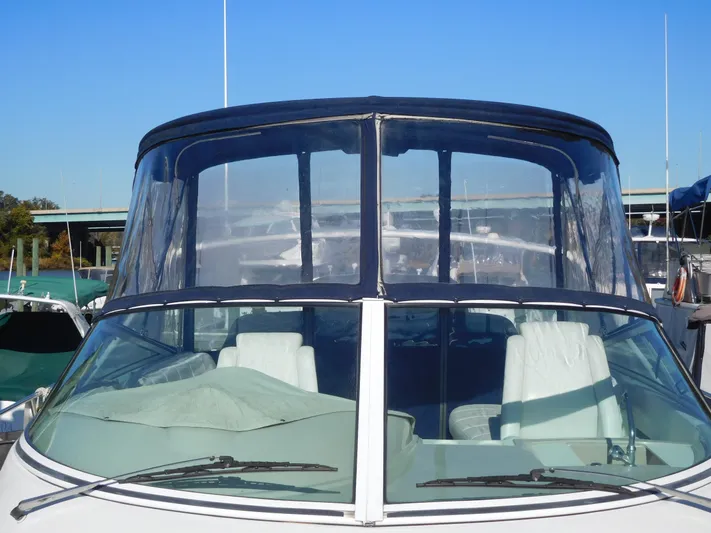  Yacht Photos Pics 2006 Carver 36 Mariner boat with clear cockpit enclosure.