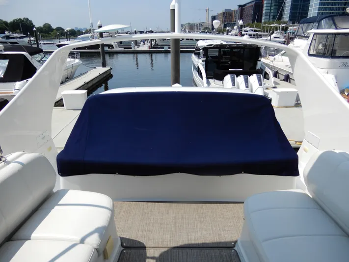  Yacht Photos Pics 2006 Carver 36 Mariner yacht interior with blue cover, docked at marina.