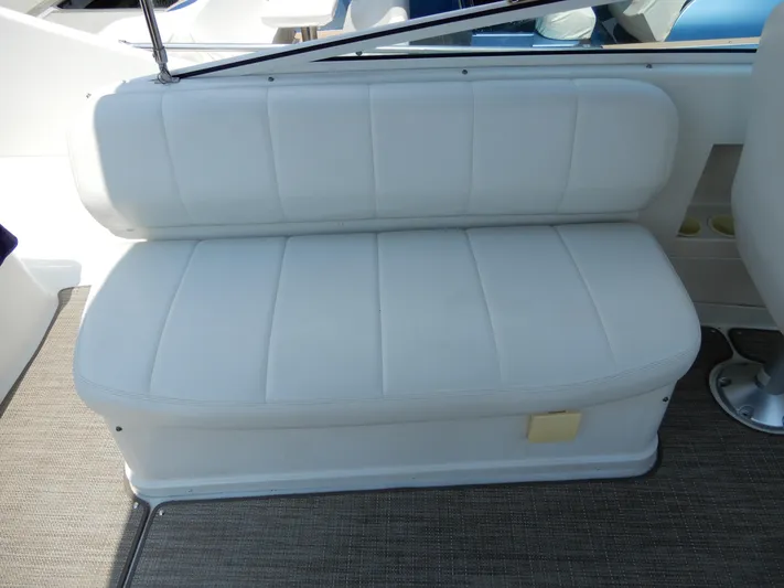  Yacht Photos Pics White cushioned seat on 2006 Carver 36 Mariner boat deck.