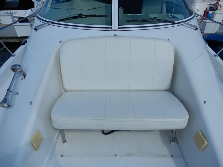  Yacht Photos Pics 2006 Carver 36 Mariner boat with white cushioned seating on deck.