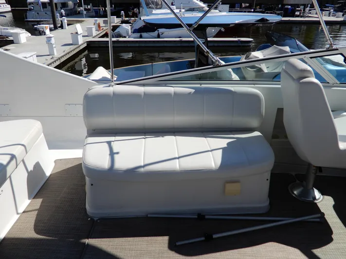  Yacht Photos Pics 2006 Carver 36 Mariner boat seating area at marina dock.