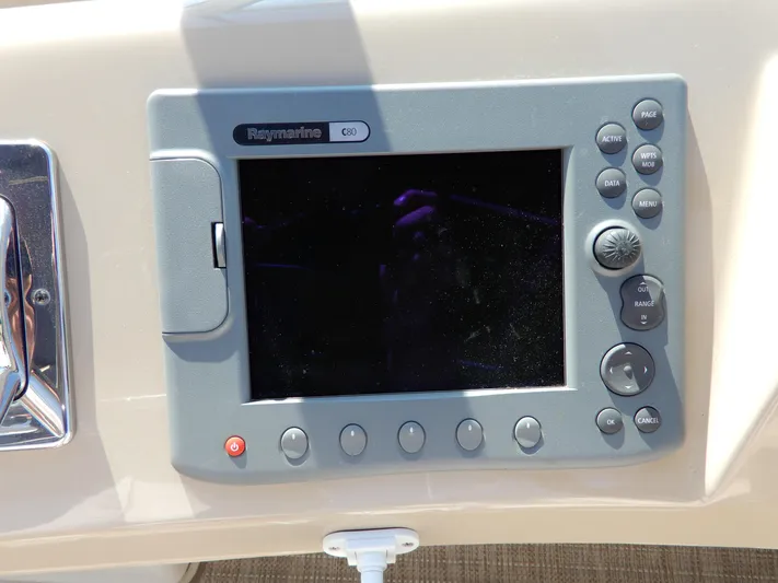  Yacht Photos Pics Raymarine C80 navigation system on 2006 Carver 36 Mariner yacht dashboard.