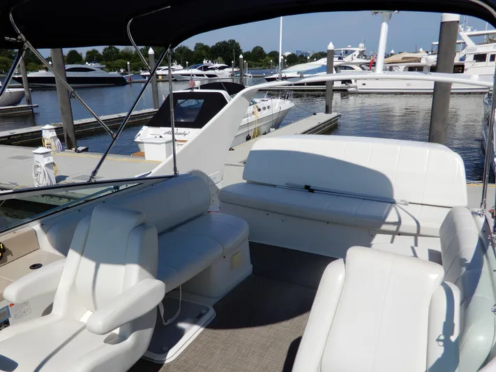  Yacht Photos Pics 2006 Carver 36 Mariner interior with white seating at marina.