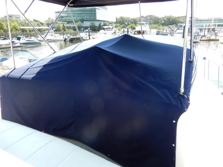  Yacht Photos Pics 2006 Carver 36 Mariner with blue cover at marina.