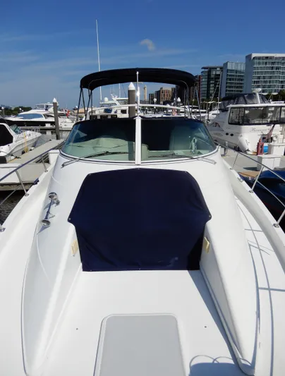  Yacht Photos Pics 2006 Carver 36 Mariner yacht docked at marina, clear sky background.