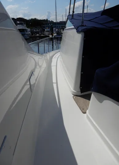  Yacht Photos Pics 2006 Carver 36 Mariner yacht deck view at marina.