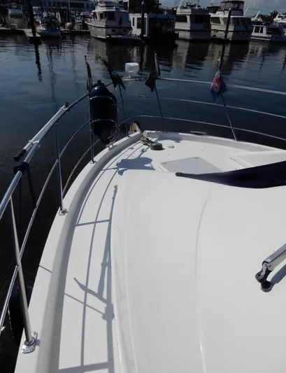  Yacht Photos Pics 2006 Carver 36 Mariner yacht docked at a marina, view of the bow.