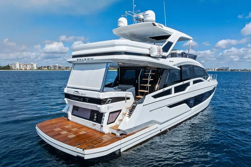 Triple T Yacht Photos Pics 2022 Galeon 640 Fly yacht on open water, showcasing sleek design and luxury features.