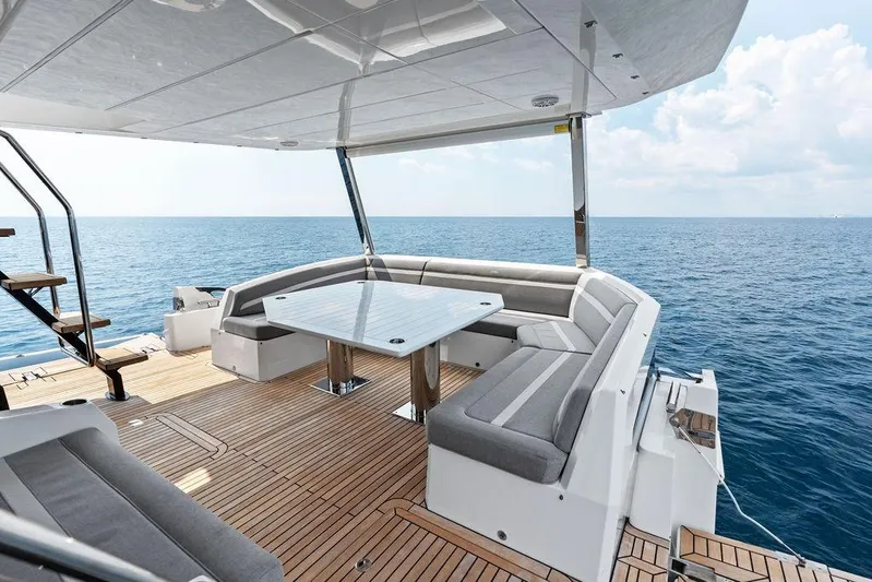 Triple T Yacht Photos Pics Luxurious 2022 Galeon 640 Fly yacht deck with elegant seating and ocean view.
