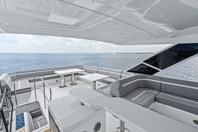 Triple T Yacht Photos Pics Luxurious 2022 Galeon 640 Fly yacht deck with elegant seating and ocean view.