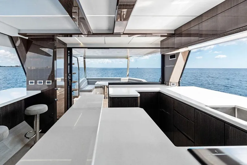 Triple T Yacht Photos Pics Luxurious interior of 2022 Galeon 640 Fly yacht with ocean view.