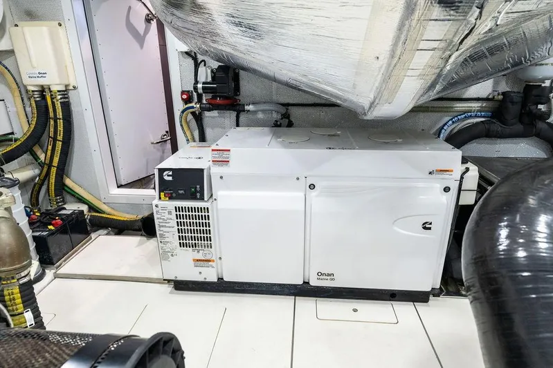 Triple T Yacht Photos Pics Engine room of 2022 Galeon 640 Fly yacht featuring Onan Marine QD generator.
