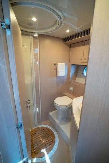  Yacht Photos Pics Luxurious bathroom in 2015 Riva 63 Virtus yacht with modern fixtures and elegant design.