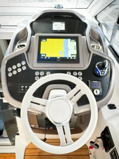  Yacht Photos Pics 2024 Sessa Marine C36 OB helm with advanced navigation system and controls.