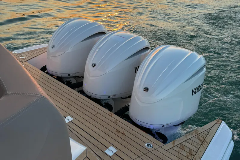  Yacht Photos Pics 2024 Sessa Marine C36 OB with triple Yamaha outboard engines on teak deck.