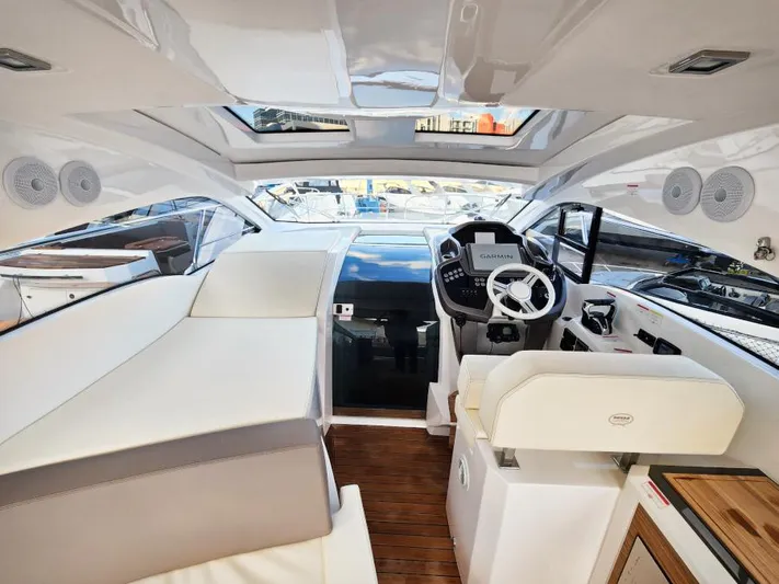  Yacht Photos Pics Interior of 2024 Sessa Marine C36 OB yacht with modern helm and seating.