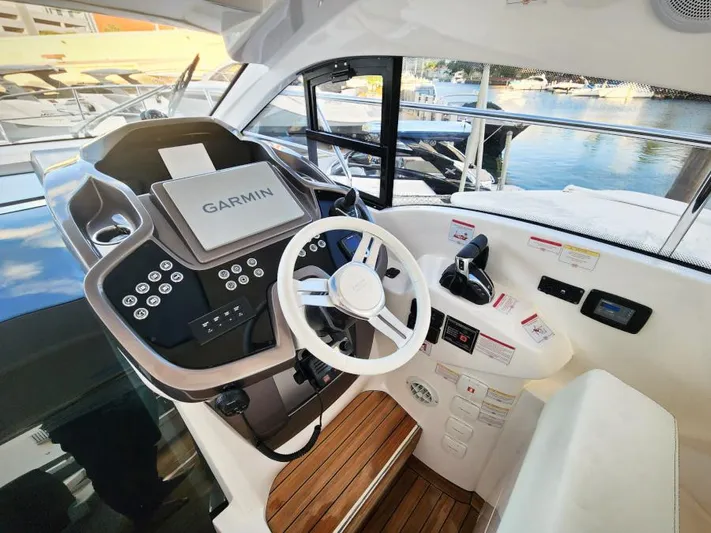  Yacht Photos Pics 2024 Sessa Marine C36 OB helm with Garmin navigation system and modern controls.