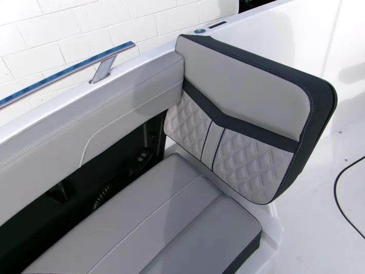  Yacht Photos Pics 2025 Monterey Elite 27 OB boat seat with gray upholstery and quilted design.