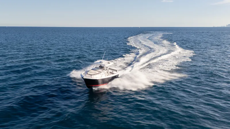  Yacht Photos Pics A 2025 SeaWell 290XL boat cruising swiftly on open ocean waters.