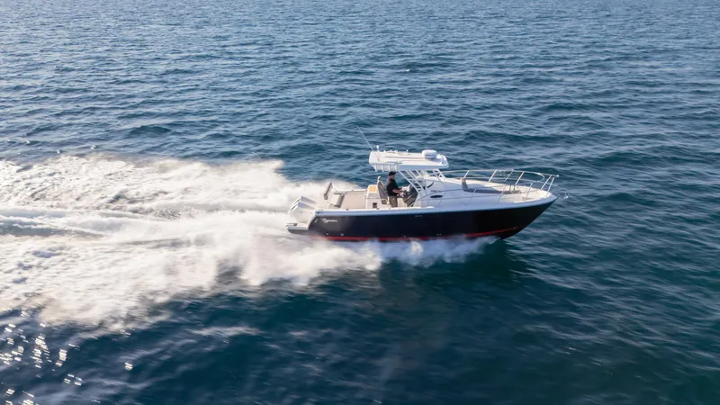  Yacht Photos Pics 2025 SeaWell 290XL boat cruising swiftly on open water.