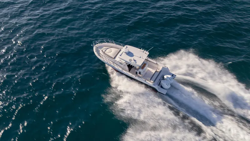  Yacht Photos Pics Aerial view of 2025 SeaWell 290XL boat cruising on open water.