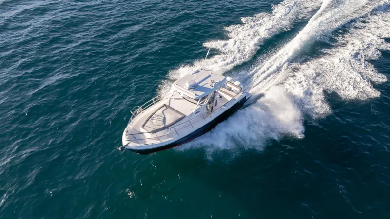  Yacht Photos Pics Aerial view of 2025 SeaWell 290XL boat cruising on open water.