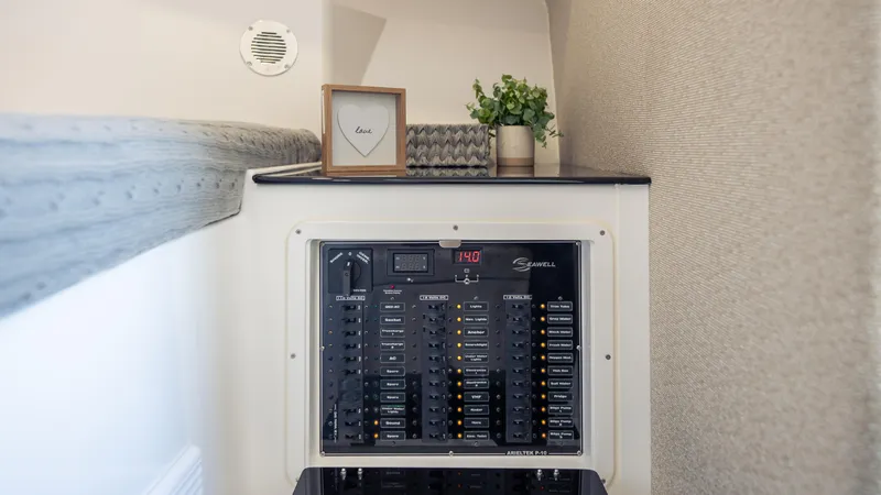  Yacht Photos Pics Electrical panel inside a 2025 SeaWell 290XL boat, with decor and ventilation.