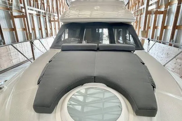 One Life Yacht Photos Pics 2004 Meridian 341 yacht with sunpad, docked in a covered marina.