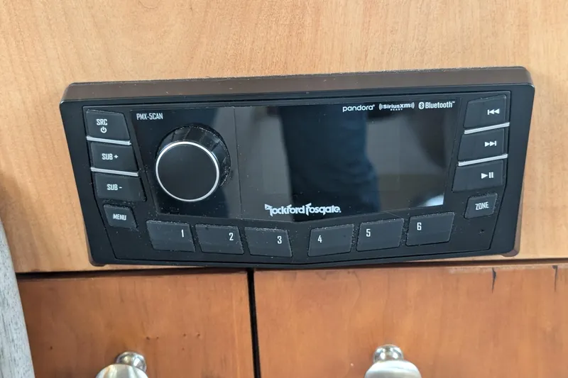 One Life Yacht Photos Pics Rockford Fosgate audio system in 2004 Meridian 341, featuring Bluetooth and Pandora integration.