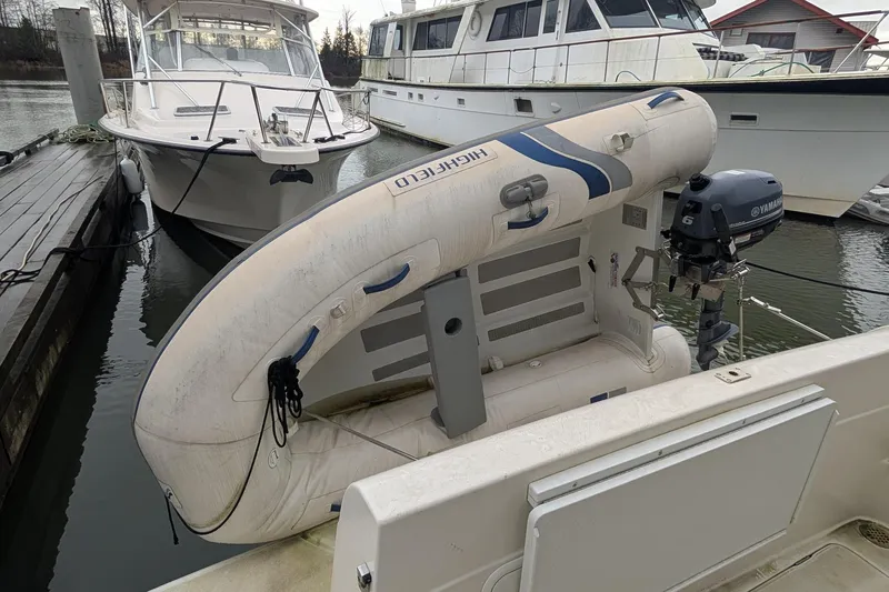One Life Yacht Photos Pics Inflatable boat with Yamaha motor docked beside Meridian 341 yacht, 2004 model.