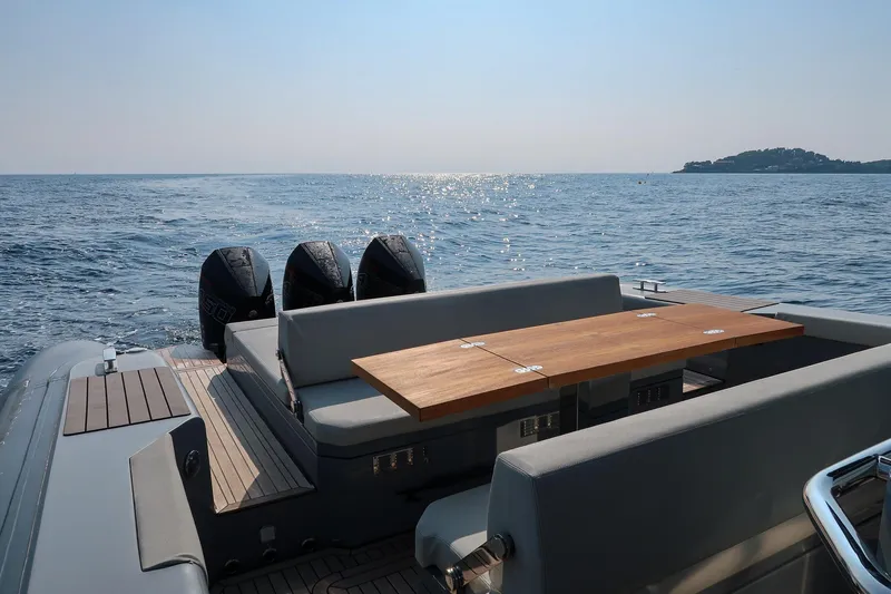  Yacht Photos Pics Luxury Pirelli 42 yacht with wooden deck, ocean view, and triple engines, 2023 model.