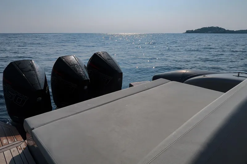  Yacht Photos Pics Luxury Pirelli 42 yacht with powerful engines cruising on open sea, 2023 model.