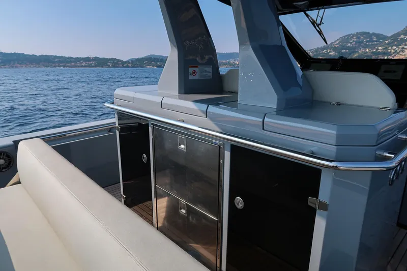  Yacht Photos Pics 2023 Pirelli 42 yacht interior with sleek seating and ocean view.