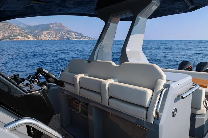  Yacht Photos Pics Luxury Pirelli 42 yacht interior with scenic ocean and coastal view, 2023 model.