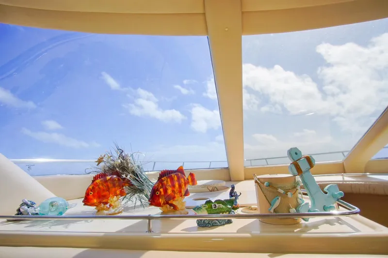  Yacht Photos Pics Interior of 2001 Sea Ray 480 Sedan Bridge with decorative marine-themed ornaments.