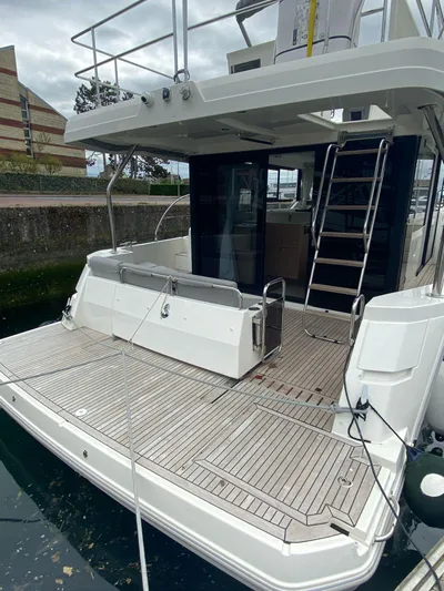  Yacht Photos Pics 2023 Beneteau Swift Trawler 41 Fly, rear deck view with ladder and seating.