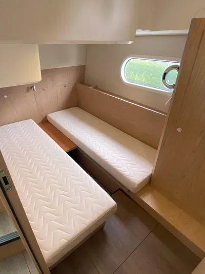  Yacht Photos Pics 2023 Beneteau Swift Trawler 41 Fly cabin with twin beds and modern design.