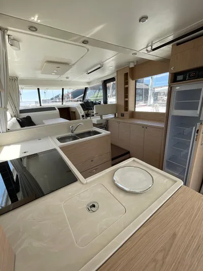  Yacht Photos Pics Interior of 2023 Beneteau Swift Trawler 41 Fly, featuring modern kitchen and spacious layout.